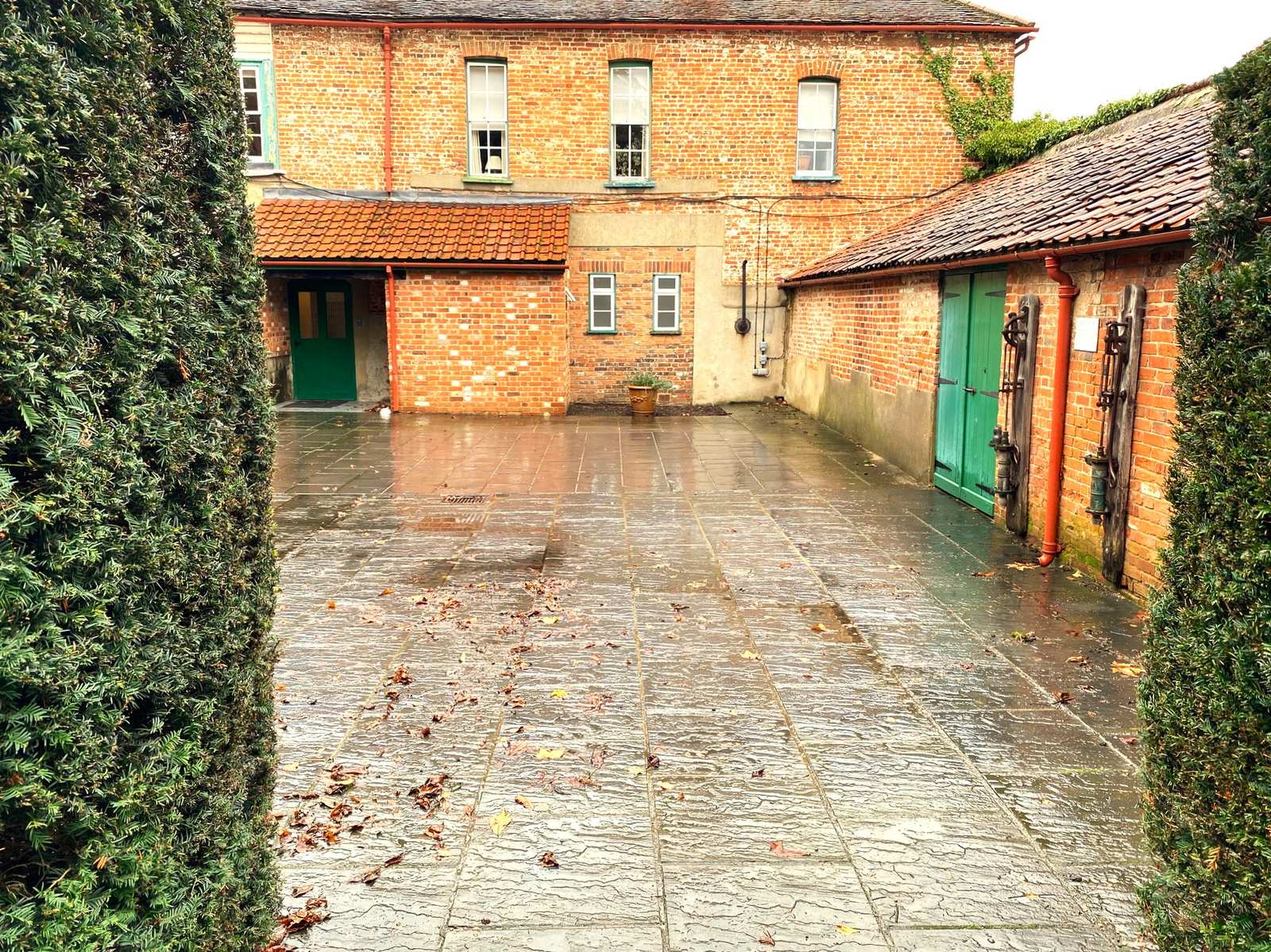 The inner court, gravelled, with the gatehouse arch beyond